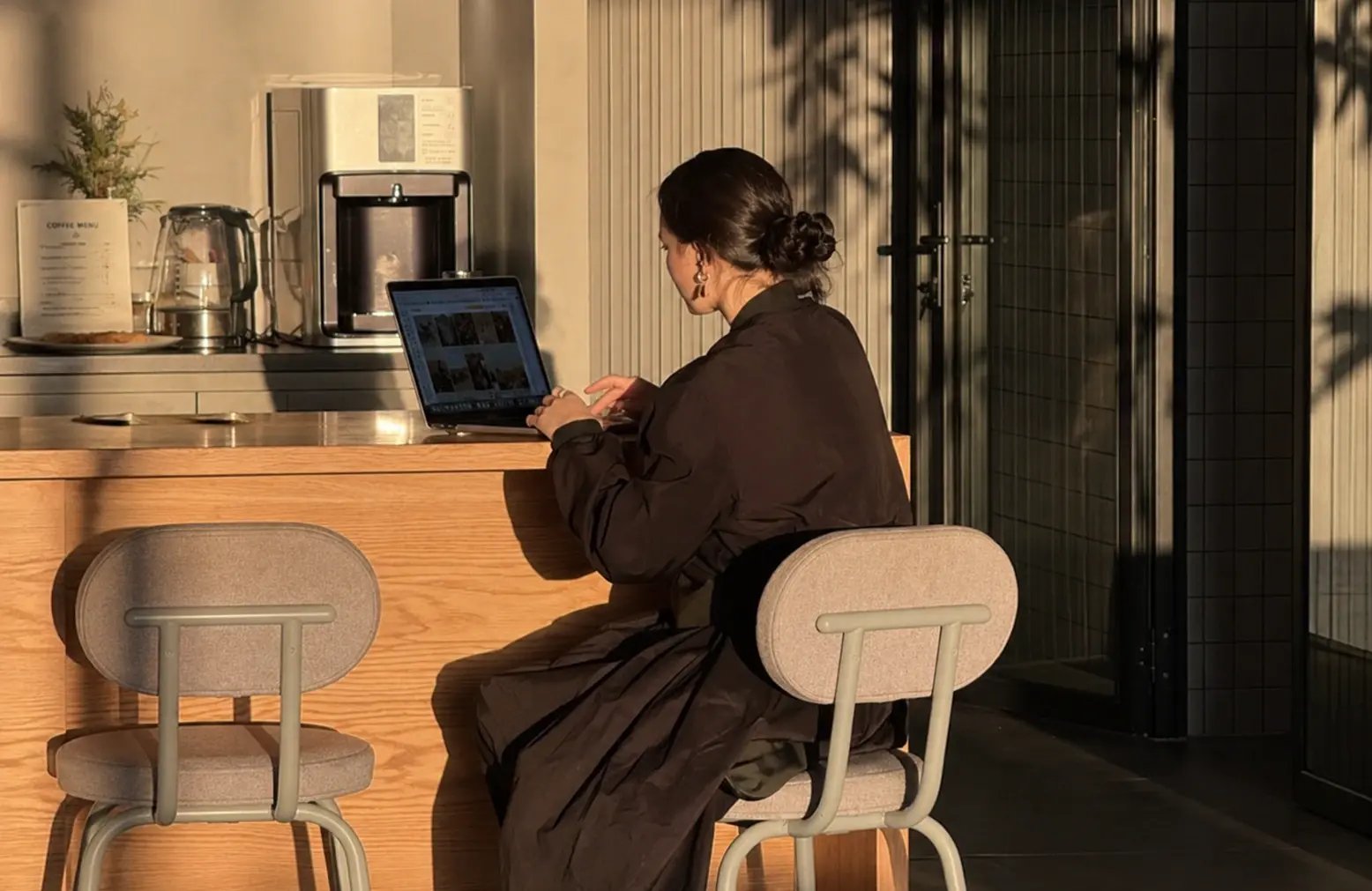 Woman sat at desk on computer