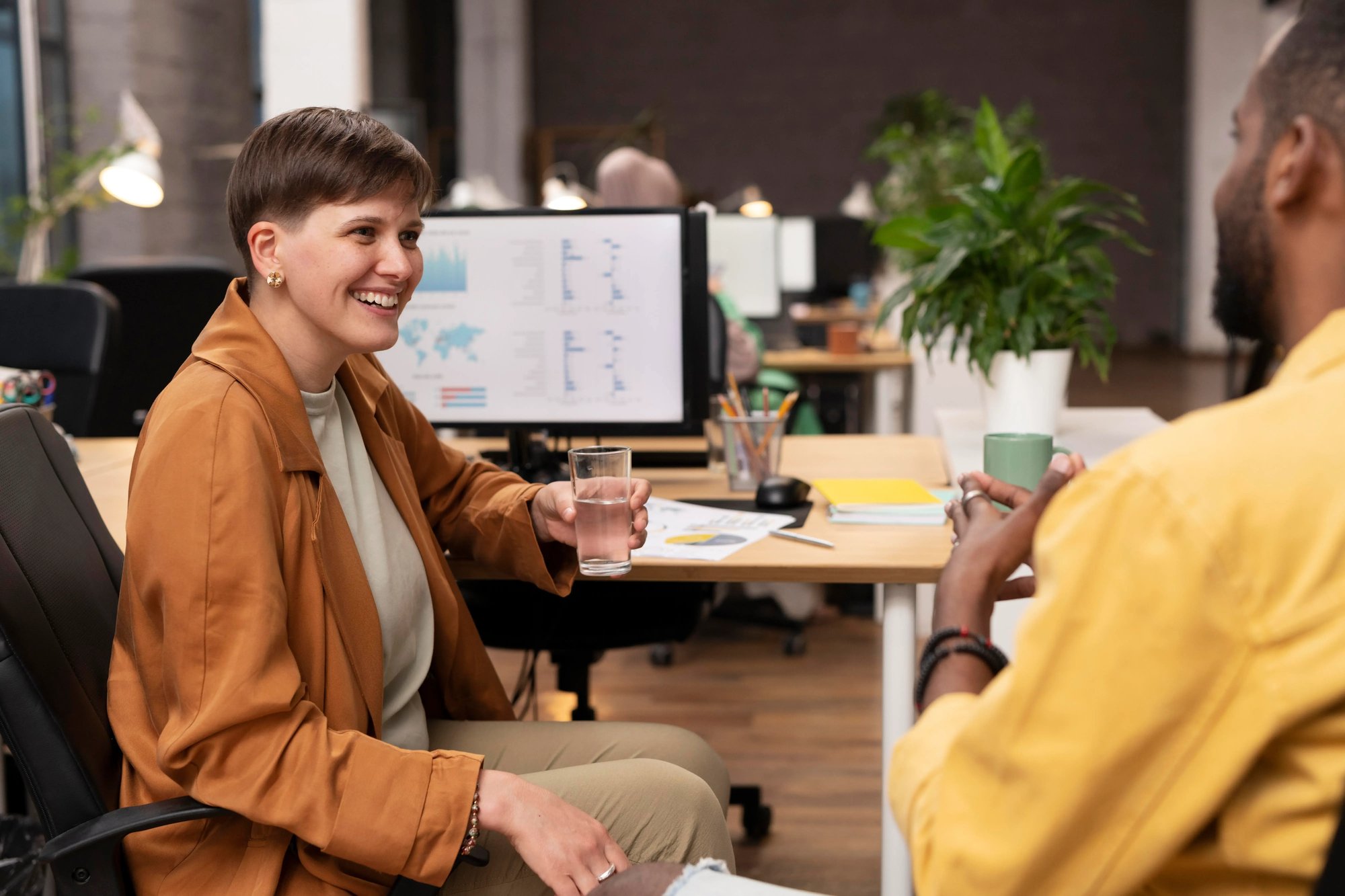 close-up-happy-colleagues-talking